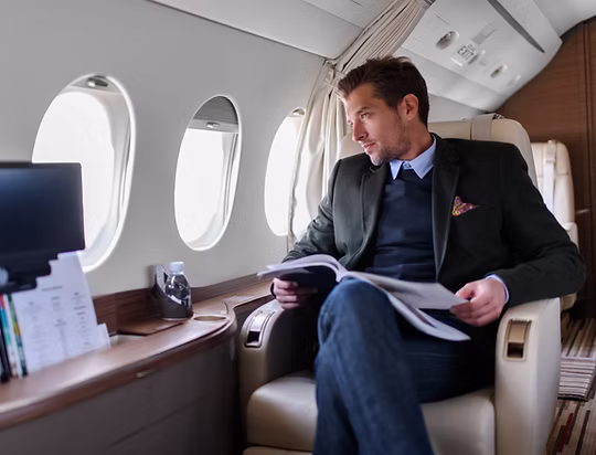 Business executive on private jet